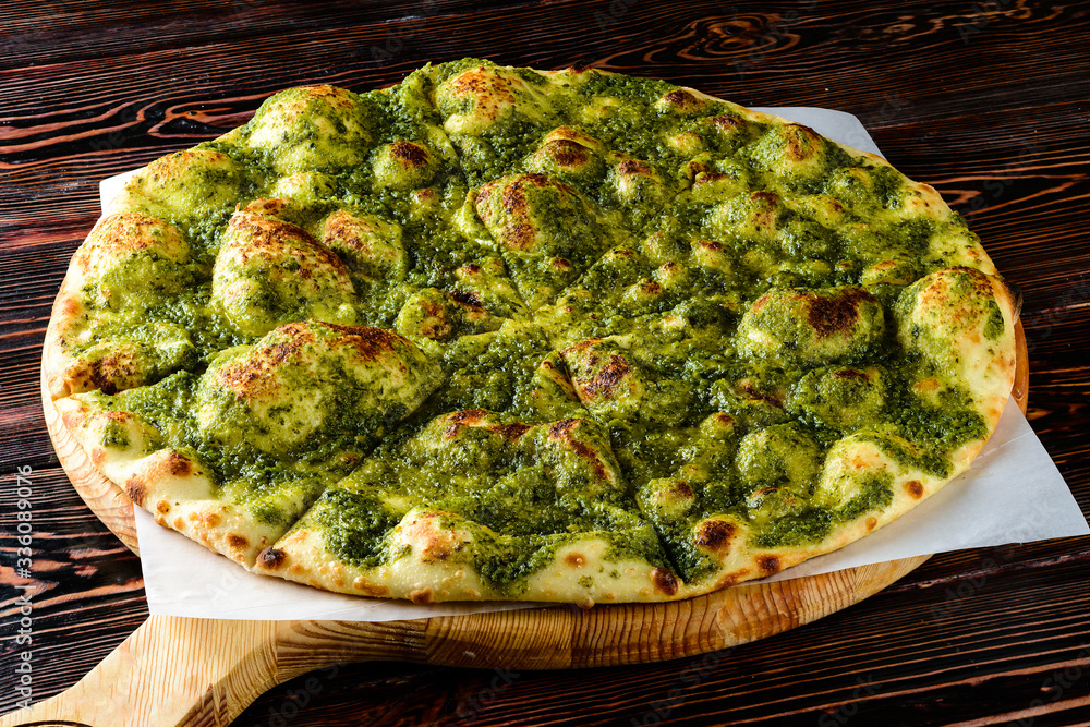 Sticker focaccia with pesto. close up pizza