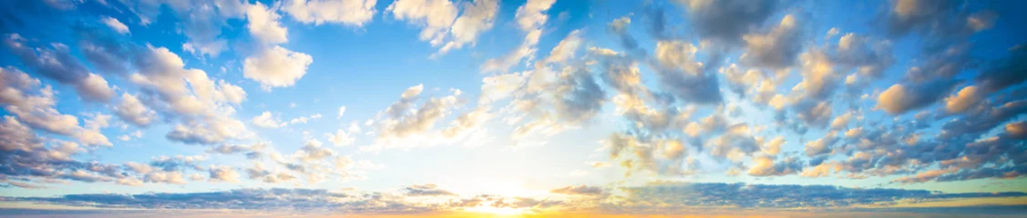 Foto op Plexiglas Blue sky clouds background. Beautiful landscape with clouds and orange sun on sky © millaf
