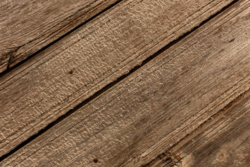  Texture of old weathered wooden fence or wall. Textured surface of grey wood (hardwood) close up. Rough grungy (grunge) background. Shabby and ragged (rugged) timber with rusty nails backdrop