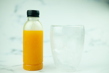 Orange juice in plastic bottle