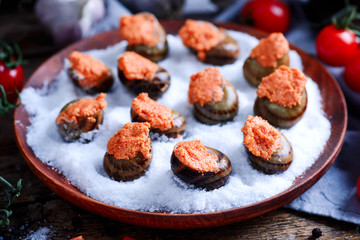 Burgundy escargot with herb butter.style rustic.