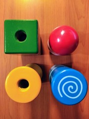 Set of hand wood toys on wooden background