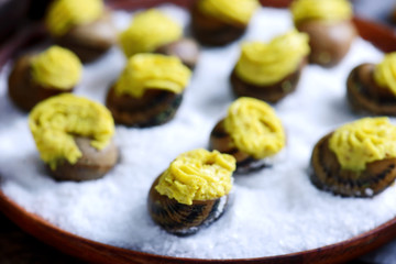 Burgundy escargot with herb butter.style rustic.