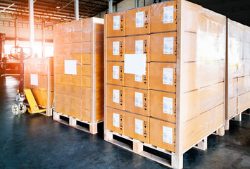 Packaging Boxes Stacked Wrapped Plastic Film with L-shape Pallet Corrugated Paper Cardboard Angle Corner Edge Protector. Supply Chain. Storehouse Commerce Shipment. Shipping Warehouse Logistics.