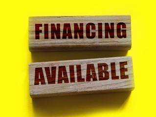 Financing available words on wooden blocks. Business sponsorship concept