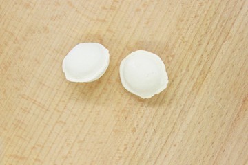 Delicious fresh frozen dumplings located on the cutting board