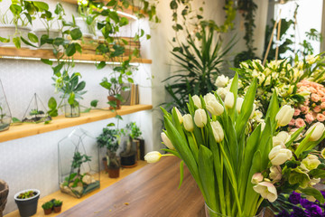 Flower shop. Interior and bouquets of fresh tulips
