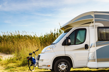 Camper and bicycle camping on nature