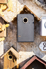 Birdhouses and hand-made and home-made feeders. Birdhouses are sold by the master.

