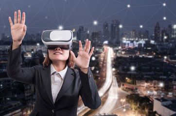 Woman with VR box of virtual reality. Future technology concept.