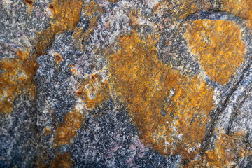 Texture of natural rock granite natural rock granite, magmatic structure with quartz and mica and traces of erosion.