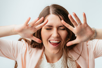 girl waving her hands