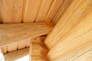 new wooden house made of round logs.