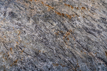 Texture of natural rock granite natural rock granite, magmatic structure with quartz and mica and traces of erosion.