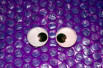 Funny Wiggle Google Eyes on Fabric Silly Background