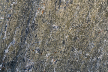 Texture of natural rock granite natural rock granite, magmatic structure with quartz and mica and traces of erosion.
