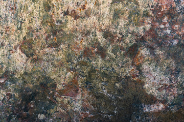 Texture of natural rock granite natural rock granite, magmatic structure with quartz and mica and traces of erosion.