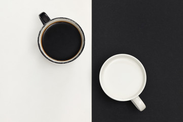 Obraz na płótnie Canvas Black And White Mug with Coffee and Milk