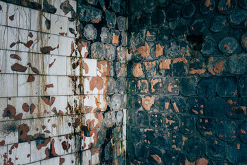 Grungy tiles in an abandoned building.  