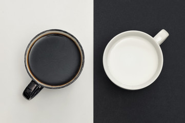 Obraz na płótnie Canvas Black And White Mug with Coffee and Milk