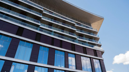 Obraz premium facade of a residential building fragment low angle view against the sky