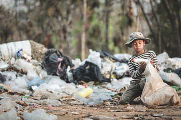 Children are junk to keep going to sell because of poverty, World Environment Day, Child labor,  human trafficking, Poverty concept