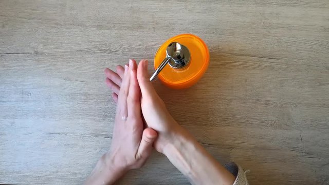 Hand sanitizing to protect yourself from the pandemic.