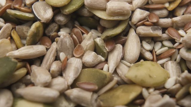 Pile of peeled sunflower and pumpkin seeds