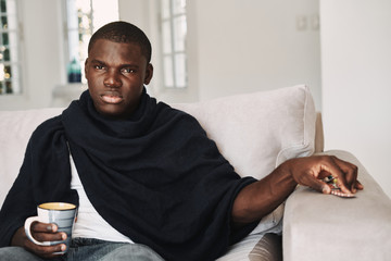 young man drinking coffee