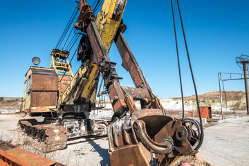 huge old rusty abandoned mining excavator