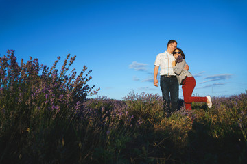 man kissing woman in lavender field