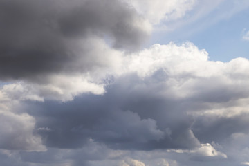 Blue sky background with tiny stratus cirrus striped clouds. Clearing day and Good windy weather