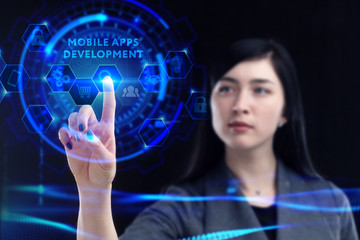 Business, Technology, Internet and network concept. Young businessman working on a virtual screen of the future and sees the inscription: Mobile apps development