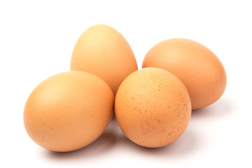Brown chicken eggs, isolated on white background.
