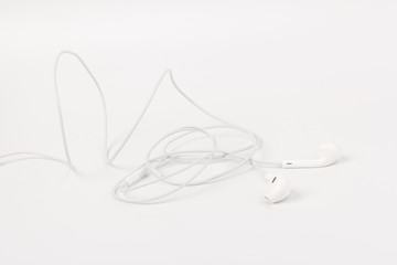 Obraz premium White headphones with headset on white isolated background