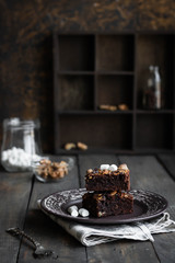 Chocolate brownie cake with marshmallows and nuts