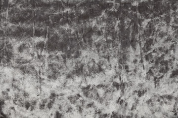 Fototapeta na wymiar Texture of grey wrinkled velvet fabric