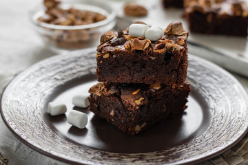 Chocolate brownie cake with marshmallows and nuts