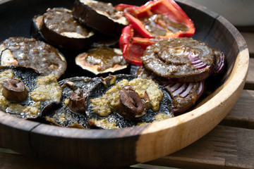 Cooked vegan barbecue meal, close up, mushrooms