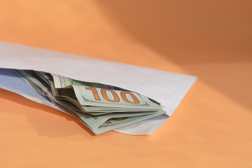 dollar money in the envelope . bonus, reward, benefits concept.