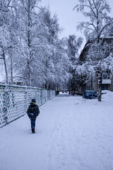 man walking in snow