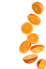 Flying fruits. Falling sliced orange fruit isolated on white background.
