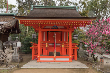This temple is traditionally design. It has deep red colours.