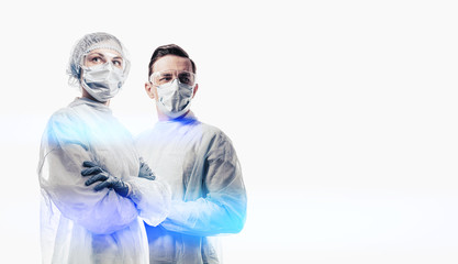 doctors man and woman on a white background in medical masks on the face