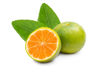 Orange fruit with green leaf isolated on white background.