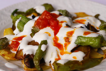 Turkish style, eggplant, pepper, potato fry meal / Frying with yogurt.