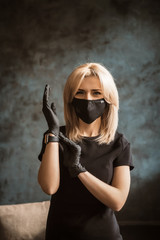 Fototapeta premium girl in a mask and gloves