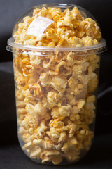 Popcorn in a large bucket.