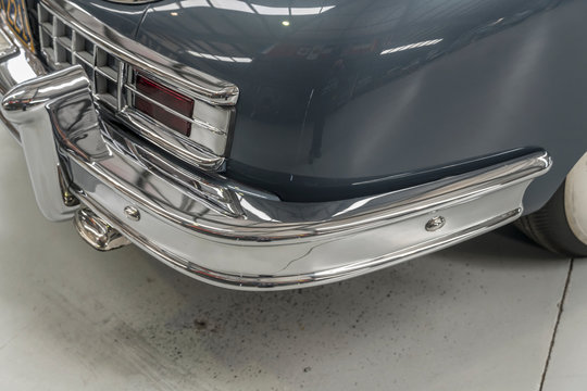 chrome plated rear bumper of vintage car, Wanaka, New Zealand