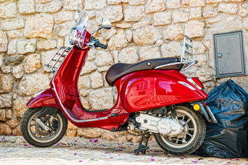 Scooter leaning against a wall in Rovinj, Croatia